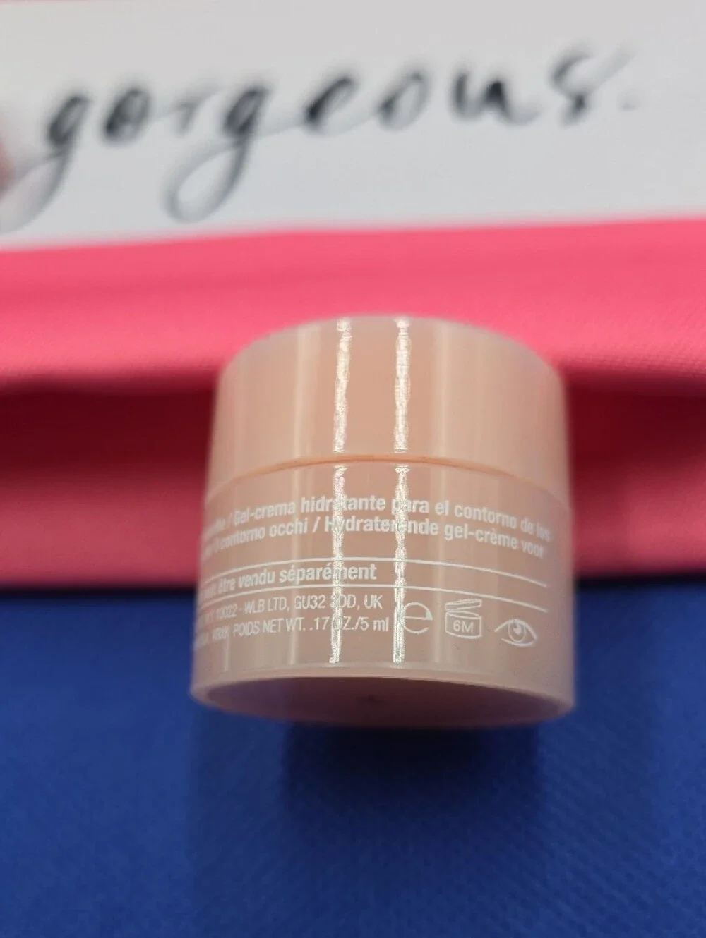 Clinique Pink and Red Striped Makeup Pouch with Mini Clinique Eye Care
